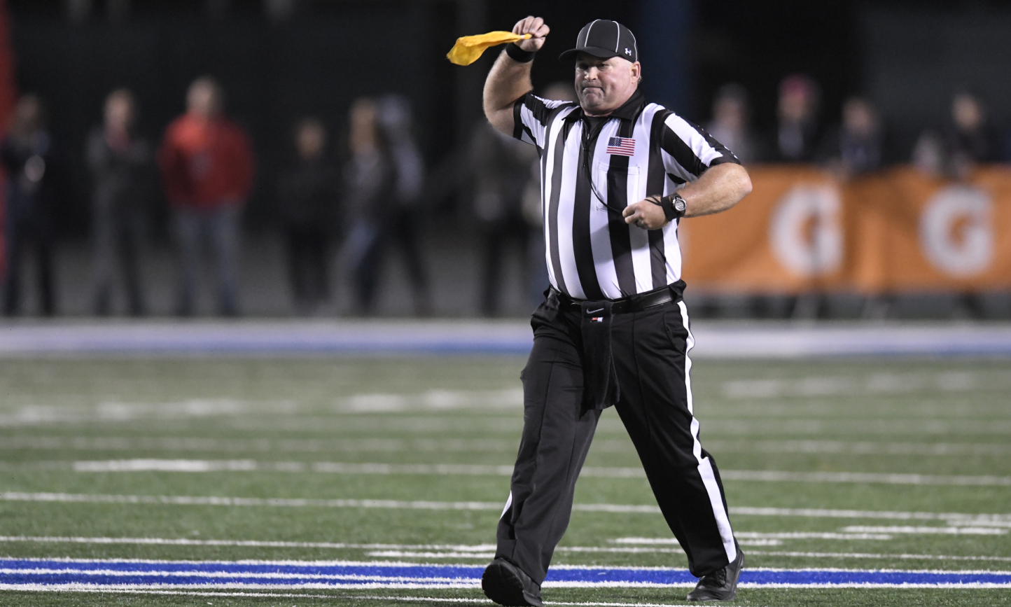 It's OK to pick up a flag or put one down late - Referee.com